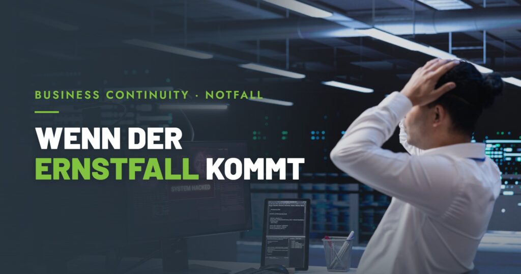 Person am Monitor mit Warnmeldung im Rechenzentrum als Symbolbild für Business Continuity